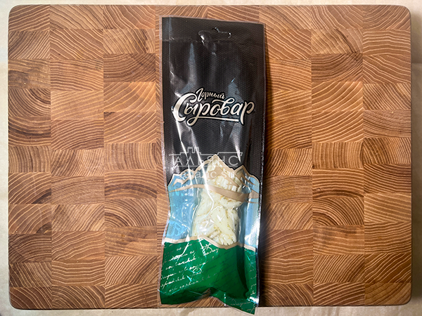 Сыр 100 гр ГОРНЫЙ СЫРОВАР (Косичка с укропом и чесноком) в Норильске